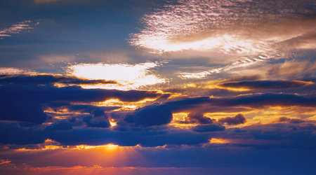 sunset on cloudy sky at blue hour