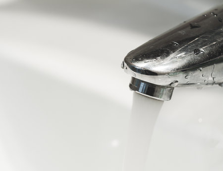 wash-sink with open water tap faucetの写真素材