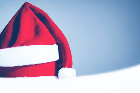 AI generated and PS altered Santa Claus Hats on snowの素材