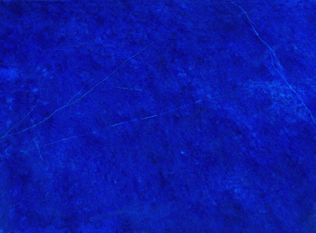 polished surface of the deep blue mineral gem stone, top grade (clear) Lapis Lazuli (lazurite)の写真素材