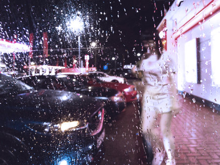 gas station parking at rainy nightの写真素材