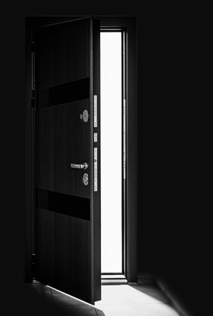 opened home metal door, light- shadeの写真素材