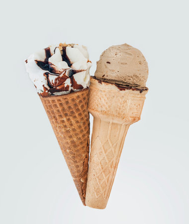 two varied  Ice- cream cones on whiteの写真素材