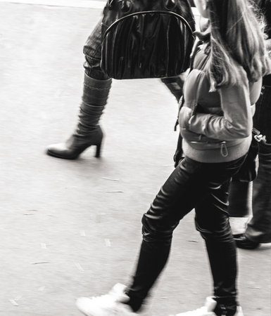 female pedestrians on an autumn streetの写真素材