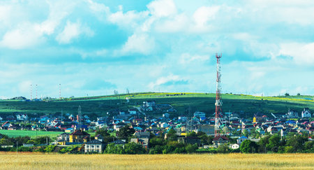 Townscape with communication tower at golden hour. Eastern Europeの写真素材