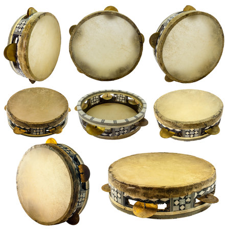 Traditional musical instument egyptian tambourine made of camel skin isolated on white background