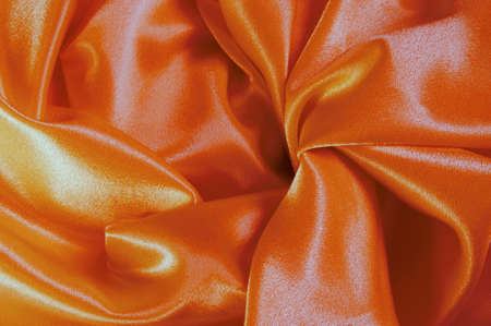 Texture of the satin fabric with many foldsの写真素材