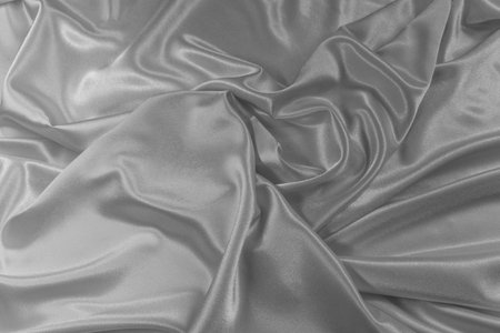 Texture of the satin fabric with foldsの写真素材