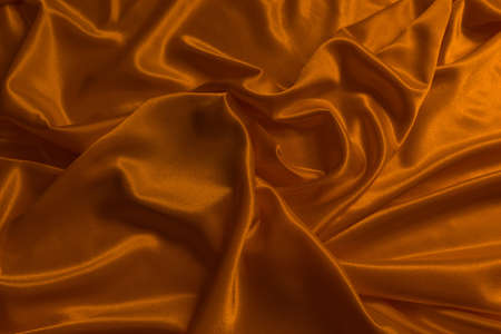Texture of the satin fabric with foldsの写真素材