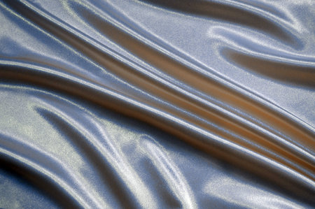 Texture of the satin fabric with foldsの写真素材