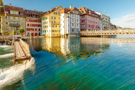A warm evening with sunset lights over the city of Lucerneの写真素材
