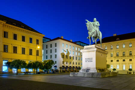 Equestrian statue of Churfuerst Maximilian of Bavaria, Wittelsbacher place, Brienner street, Munich, Bavaria, Germany. In the background a part of the Siemens headquater.のeditorial素材