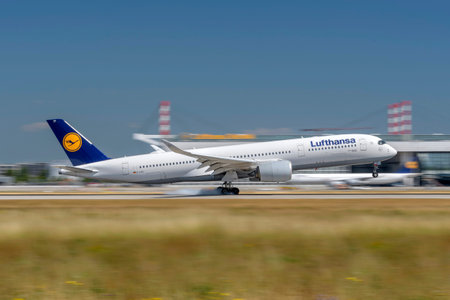 Munich, Germany - June 29. 2023 : Lufthansa Airbus A350-941 with the aircraft registration D-AIXG during landing to the southern runway 26L of the Munich Airport MUC EDDMのeditorial素材