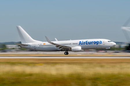 Munich, Germany - June 29. 2023 : Air Europa Boeing 737-8AS with the aircraft registration EC-NVQ during landing to the southern runway 26L of the Munich Airport MUC EDDMのeditorial素材
