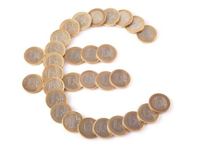 euro symbol with one euro coins on a white backgroundの写真素材