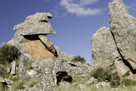 rock formation bolivian andes blue sky white clouds background copy spaceの写真素材
