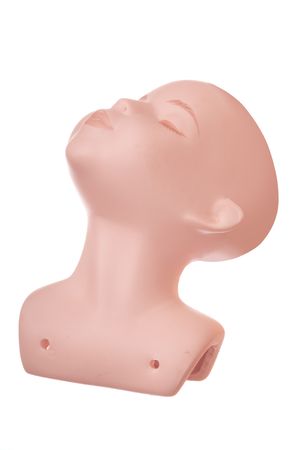 old ceramic doll head isolated on whiteの写真素材