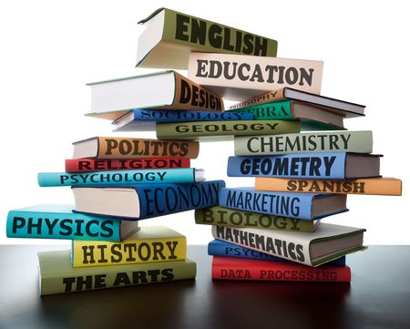 school books on a stack educational textbooks wih text education leads to knowledgeの写真素材