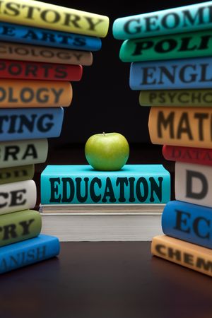 education study books with text learning building knowledge at school with healthy appleの写真素材