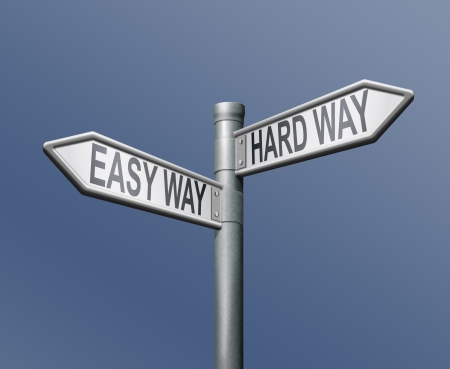 easy and hard ward roadsign arrow on blue backgroundの写真素材
