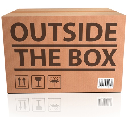 Outside the Box innovation, unconventional and creative thinking in solving a problem or brainstorming cardboard package の写真素材