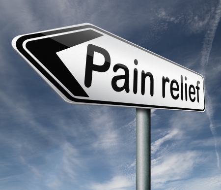 pain relief or management by painkiller or other treatment chronic back injury road sign with textの写真素材
