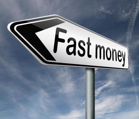 fast easy money quick extra cash make a fortune online income road sign arrowの写真素材