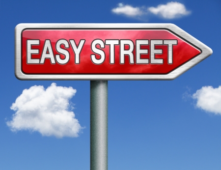 easy street road sign arrow indicating easy solutions or a way to avoid problems safe way taking risk comfortable comfort zone secure route safe wayの写真素材