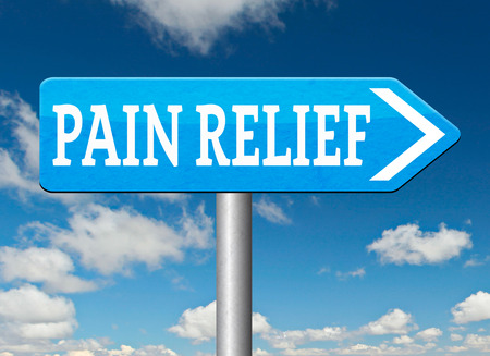 pain relief or management by painkiller or other treatment chronic back pain road sign arrowの写真素材