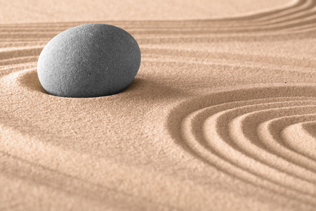 zen meditation stone background in Japanese sand garden. Spa and wellness stones treatment,の写真素材