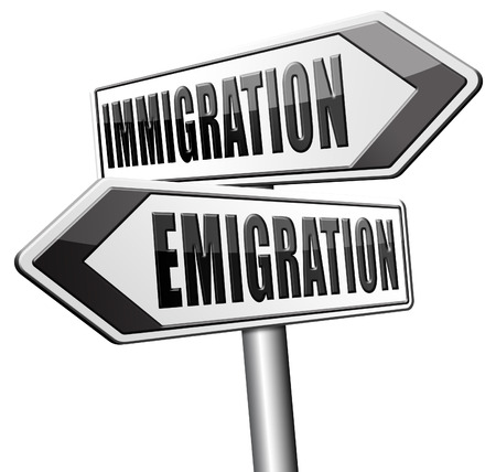 immigration or emigration political or economic migration by refugees or moving across the border by economic migrants signの写真素材