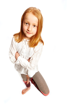 Girl standing on one legの写真素材