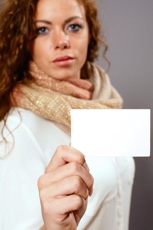 Woman with white advertising signの写真素材