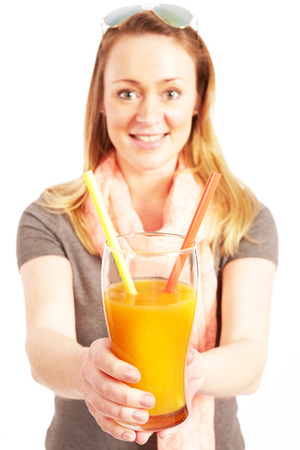 Young pretty woman with Orange Juiceの写真素材