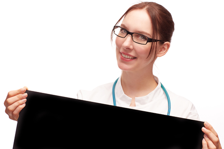 Woman doctor with black sign friendly smiles as Cut .の写真素材