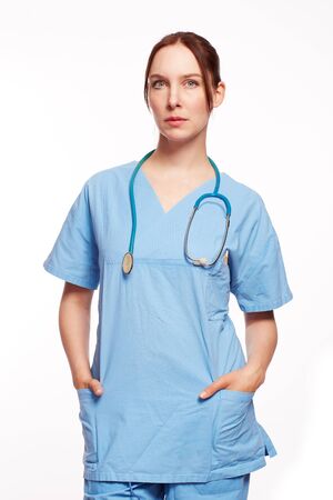 Nurse in blue dress with Op stethoscope as Cutの写真素材