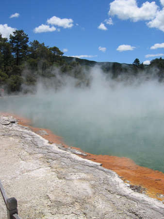The Champagne Pool, a hot spring in an old volcano crater in the thermal are Wai-O-Tapu near Rotorua, New Zealandの写真素材
