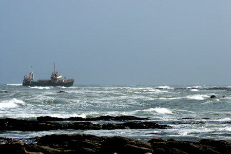 Abandoned shipwreck before the coast of Namibiaの写真素材
