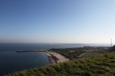 View over the northern beach of Heligoland to the neighbouring island Düne.の写真素材