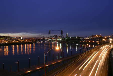 Portland, Oregon view of the Steel Bridge with light reflections on the Willamette Riverの写真素材