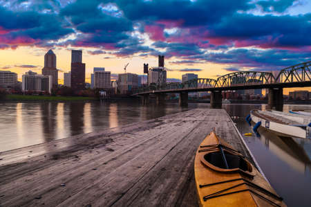 Portland, Oregon Panorama   Sunset scene with dramatic sky and light reflections on the Willamette River の写真素材