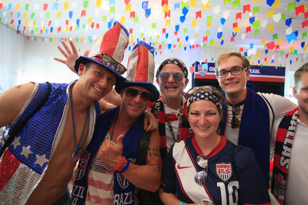 MANAUS, BRAZIL- JUNE 22: American Soccer / Football Fans at the American Outlaws party prior to the US vs Portugal match.  Fans are dressed wearing the USA team jersey and American colors.のeditorial素材
