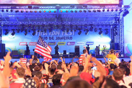 RIO DE JANEIRO - JUNE 16: Hundreds of American World Cup Fans gather at the FIFA Fan Fest in Praia do Copacabana to watch the USA vs Ghana match on the giant screen.のeditorial素材