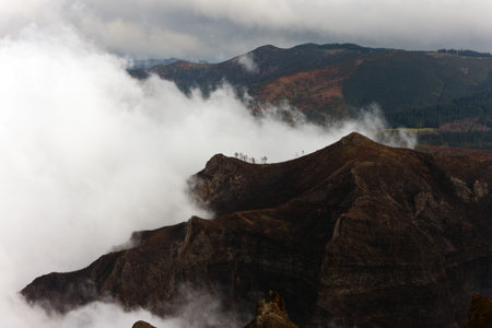 view of the clouds with the peak of Mount