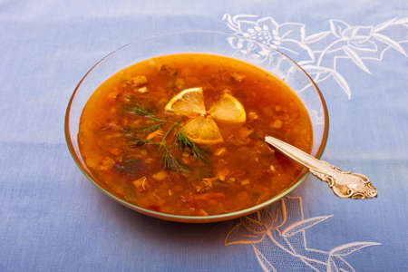 Traditional russian dish on blue tableclothの写真素材