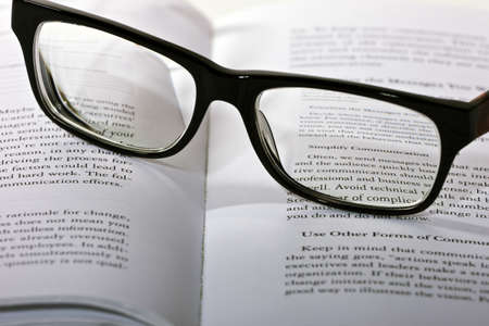 photo of eyeglasses lie on the bookの写真素材