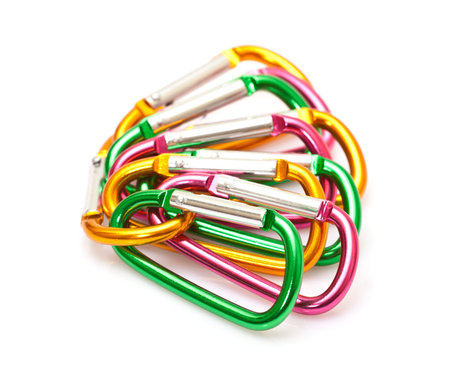 carbines for the insurance are linked together on a white backgroundの写真素材