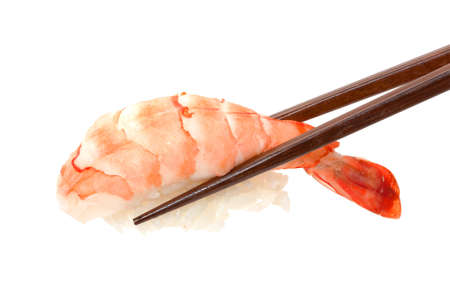 Sushi with chopsticks isolated over white backgroundの写真素材