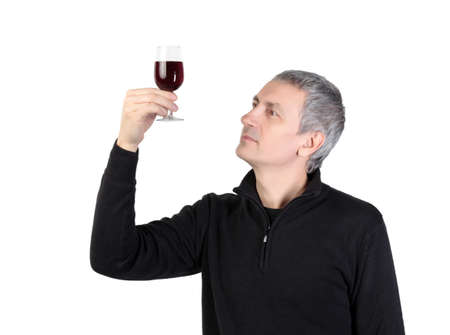Man holding a glass of red port wine, on white backgroundの写真素材