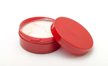 Opening a Bottle Cream on a white backgroundの写真素材